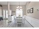 Beautiful dining area showcasing elegant decor, natural light, and a seamless layout at 182 Santarem Cir, Punta Gorda, FL 33983