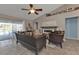 Spacious living room with fireplace and access to the backyard at 182 Santarem Cir, Punta Gorda, FL 33983