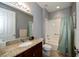 Guest bathroom with tub, shower, and granite vanity at 25623 Heritage Lake Blvd. # 57, Punta Gorda, FL 33983