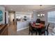 Spacious kitchen with granite countertops, stainless steel appliances, and a breakfast bar at 25623 Heritage Lake Blvd. # 57, Punta Gorda, FL 33983