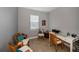 Home office with a desk, two chairs, and window at 25623 Heritage Lake Blvd. # 57, Punta Gorda, FL 33983