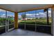 Spacious screened patio overlooking a tranquil landscape at 25623 Heritage Lake Blvd. # 57, Punta Gorda, FL 33983