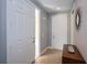 Clean entryway with tile floors and built-in cabinet at 25623 Heritage Lake Blvd. # 57, Punta Gorda, FL 33983