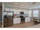 Modern kitchen with stainless steel appliances and granite countertops at 25623 Heritage Lake Blvd. # 57, Punta Gorda, FL 33983