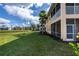 Building exterior showcasing a well-maintained community at 25623 Heritage Lake Blvd. # 57, Punta Gorda, FL 33983