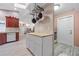 Kitchen features butcher block island and laundry access at 28522 Coco Palm Dr, Punta Gorda, FL 33982