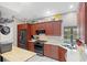 Modern kitchen with granite countertops, stainless steel appliances, and ample cabinetry at 28522 Coco Palm Dr, Punta Gorda, FL 33982
