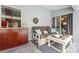 Relaxing patio with a sofa, table and outdoor kitchen at 28522 Coco Palm Dr, Punta Gorda, FL 33982