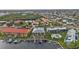 Aerial view of waterfront property with community pool and boat slips at 3216 Purple Martin Dr # 122, Punta Gorda, FL 33950
