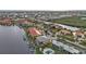 Aerial view of waterfront community with pool and boat docks at 3216 Purple Martin Dr # 122, Punta Gorda, FL 33950