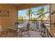 Screened balcony boasting water views and outdoor dining furniture at 3216 Purple Martin Dr # 122, Punta Gorda, FL 33950