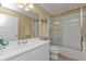 Clean bathroom with a shower/tub combo and white vanity at 3216 Purple Martin Dr # 122, Punta Gorda, FL 33950