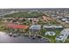 Aerial view of waterfront property with community pool and boat slips at 3216 Purple Martin Dr # 122, Punta Gorda, FL 33950
