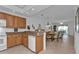 Open-concept kitchen with breakfast bar and dining area at 3216 Purple Martin Dr # 122, Punta Gorda, FL 33950