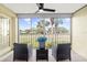 Peaceful screened balcony overlooking a lush green golf course at 433 Cerromar Ln # 441, Venice, FL 34293
