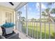 Relaxing screened balcony with golf course view and patio furniture at 433 Cerromar Ln # 441, Venice, FL 34293