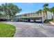 Community parking with covered carports at 433 Cerromar Ln # 441, Venice, FL 34293