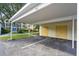Covered carport in front of condo building at 433 Cerromar Ln # 441, Venice, FL 34293