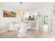 Dining area with kitchen and access to balcony at 433 Cerromar Ln # 441, Venice, FL 34293