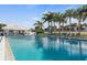 Refreshing community pool with surrounding lounge chairs at 433 Cerromar Ln # 441, Venice, FL 34293