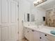Bright bathroom with white vanity, single sink, and shower/tub combo at 5115 Melbourne St # A206, Punta Gorda, FL 33980