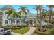 Community clubhouse with inviting design and landscaping at 5115 Melbourne St # A206, Punta Gorda, FL 33980