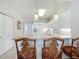 Kitchen with breakfast bar and pineapple-design stools at 5115 Melbourne St # A206, Punta Gorda, FL 33980
