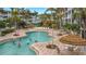Resort-style pool with plenty of lounge chairs at 5115 Melbourne St # A206, Punta Gorda, FL 33980