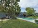 Private backyard oasis with a refreshing pool at 107 Dunn Ne Dr, Port Charlotte, FL 33952
