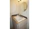 Updated bathroom with granite countertop and modern vanity at 107 Dunn Ne Dr, Port Charlotte, FL 33952