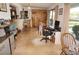 Bright dining area with tile floors and access to backyard at 107 Dunn Ne Dr, Port Charlotte, FL 33952