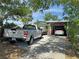Long driveway with enough space for multiple vehicles and boat at 107 Dunn Ne Dr, Port Charlotte, FL 33952