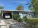 Cute bungalow with carport and nicely landscaped yard at 107 Dunn Ne Dr, Port Charlotte, FL 33952