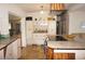 Modern kitchen with an island and stainless steel appliances at 107 Dunn Ne Dr, Port Charlotte, FL 33952