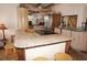 Island kitchen with stainless steel appliances and granite countertops at 107 Dunn Ne Dr, Port Charlotte, FL 33952