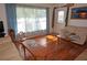 Bright living room with hardwood floors and large windows at 107 Dunn Ne Dr, Port Charlotte, FL 33952