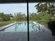 Inviting swimming pool with a large backyard at 107 Dunn Ne Dr, Port Charlotte, FL 33952