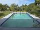 Inviting rectangular pool in a backyard setting at 107 Dunn Ne Dr, Port Charlotte, FL 33952