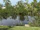 Picturesque waterfront view with lush foliage at 107 Dunn Ne Dr, Port Charlotte, FL 33952