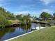 Tranquil canal-front property with dock at 107 Dunn Ne Dr, Port Charlotte, FL 33952