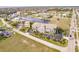 An elevated view of a waterfront condo building with parking and boat docks at 1349 Aqui Esta Dr # 125, Punta Gorda, FL 33950