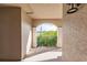 Covered balcony overlooking tropical landscaping at 1349 Aqui Esta Dr # 125, Punta Gorda, FL 33950