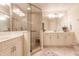 Spa-like bathroom with double vanity and large shower at 1349 Aqui Esta Dr # 125, Punta Gorda, FL 33950