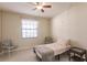 Small bedroom with twin bed and window at 1349 Aqui Esta Dr # 125, Punta Gorda, FL 33950