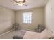 Small bedroom with twin bed and window at 1349 Aqui Esta Dr # 125, Punta Gorda, FL 33950