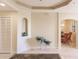 Elegant entryway with decorative niches and tile floor at 1349 Aqui Esta Dr # 125, Punta Gorda, FL 33950