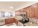 Modern kitchen with stainless steel appliances and granite countertops at 1349 Aqui Esta Dr # 125, Punta Gorda, FL 33950