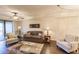 Living room featuring hardwood floors and neutral decor at 1349 Aqui Esta Dr # 125, Punta Gorda, FL 33950