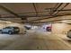 Underground parking garage with multiple vehicle spaces at 1349 Aqui Esta Dr # 125, Punta Gorda, FL 33950