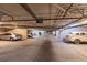Ample parking garage with various parking spaces at 1349 Aqui Esta Dr # 125, Punta Gorda, FL 33950
